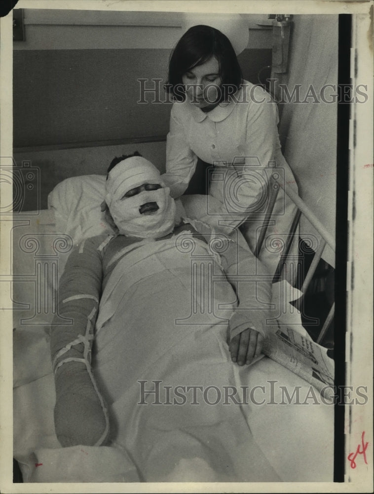 1969 Press Photo Joseph Zeph in hospital after saving baby from burning in fire-Historic Images