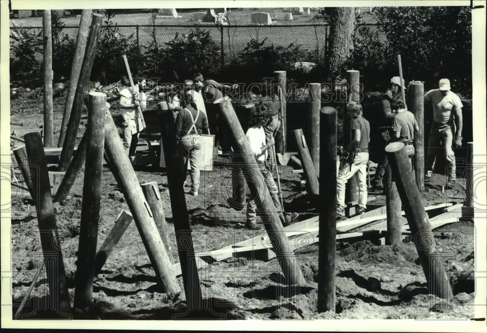 1990 Press Photo Volunteers work lumber for playground, Elementary School Galway - Historic Images