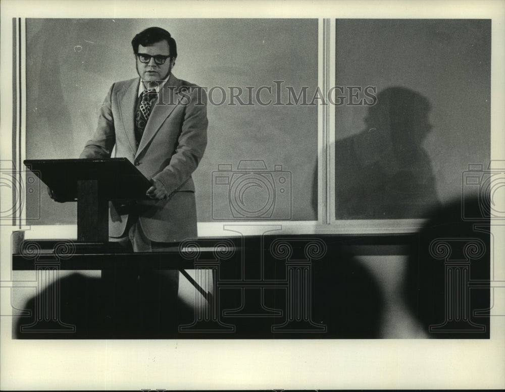 1976 Author Garry Wills speaking at a lectern - Historic Images