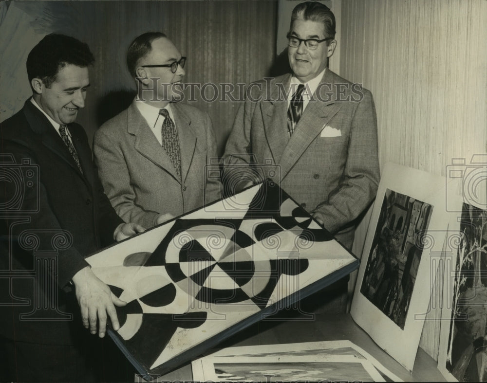 1954 Press Photo Judges look over entries in scholastic art exhibit, Albany, NY-Historic Images