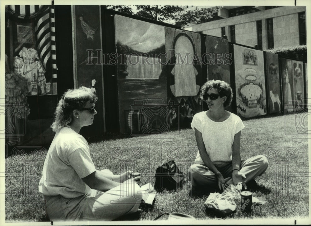 1987 Two state workers eat by 100 foot Mural done by Albany Students - Historic Images