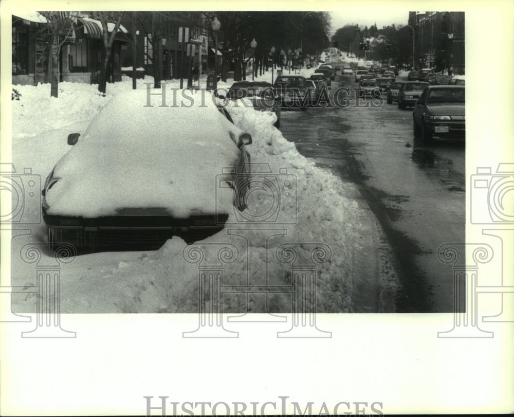 1991 Saratoga, New York car covered by pile of snow - Historic Images