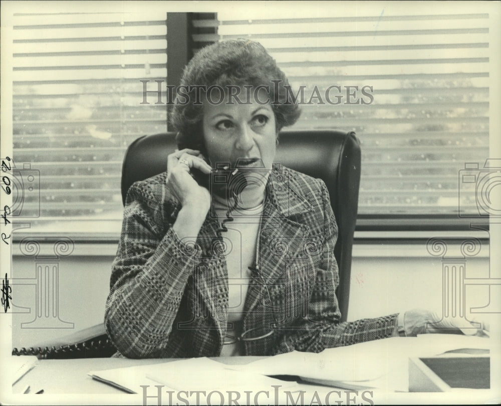 1977 Darice Nelson takes a phone call in her office - Historic Images