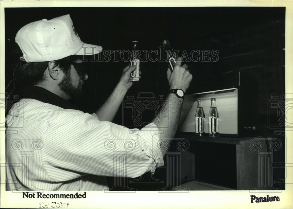 1992 Saratoga, NY Mineral Water Co. staff inspects bottles of water - Historic Images