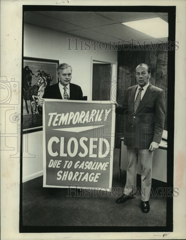 1973 Albany, New York businessmen display gasoline shortage sign - Historic Images