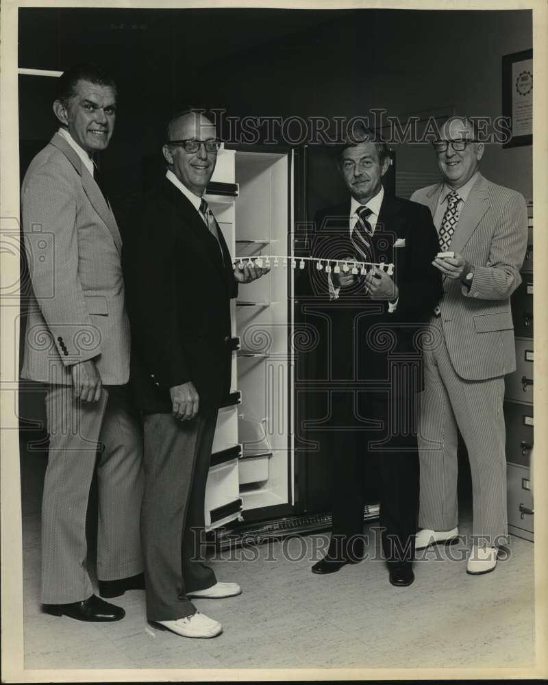 1973 Press Photo Albany, New York businessmen show off new product - Historic Images