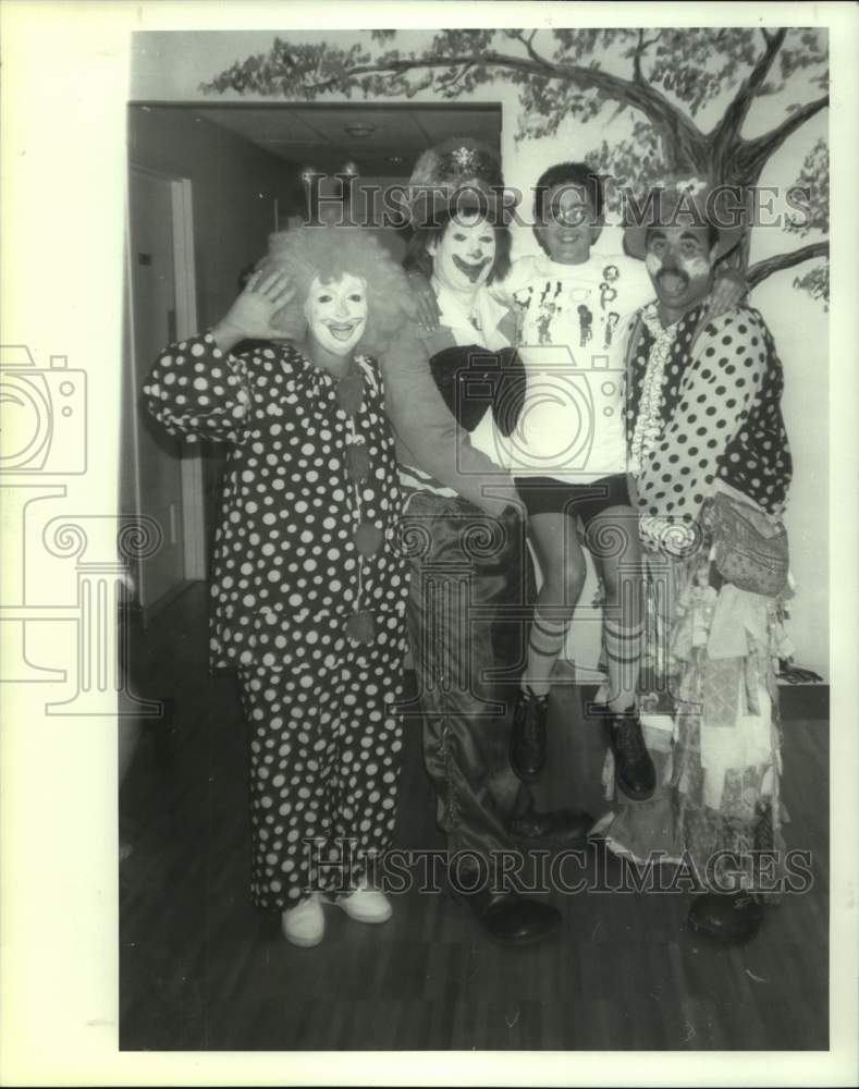 1989 Clowns entertain liver transplant patient in Philadelphia, PA - Historic Images