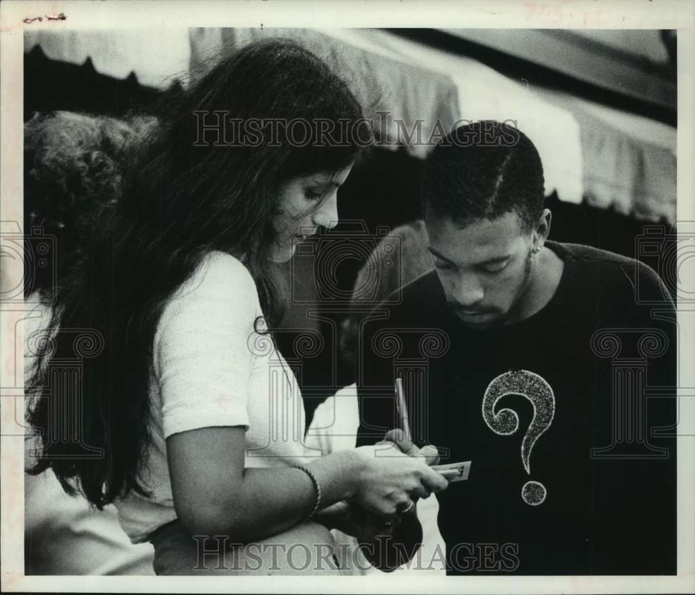 1977 Anti-war activist collects signatures in Schenectady, New York - Historic Images