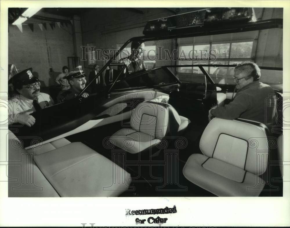 1993 New York police officers examine boat used for DARE program - Historic Images