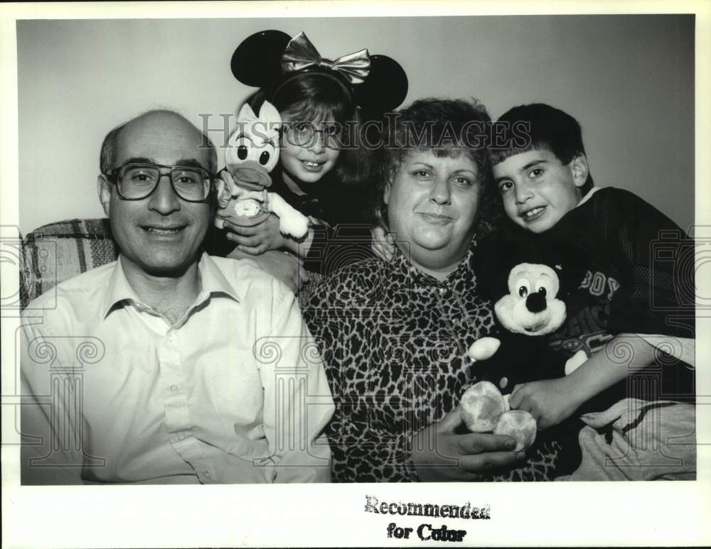 1992 Sarandrea familly with Disney mementos in their Albany, NY home - Historic Images