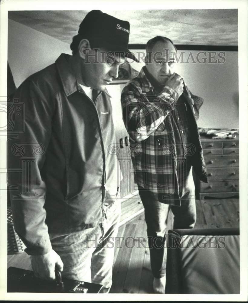 1990 Men examine fiberglass contamination in Corinth, New York home-Historic Images
