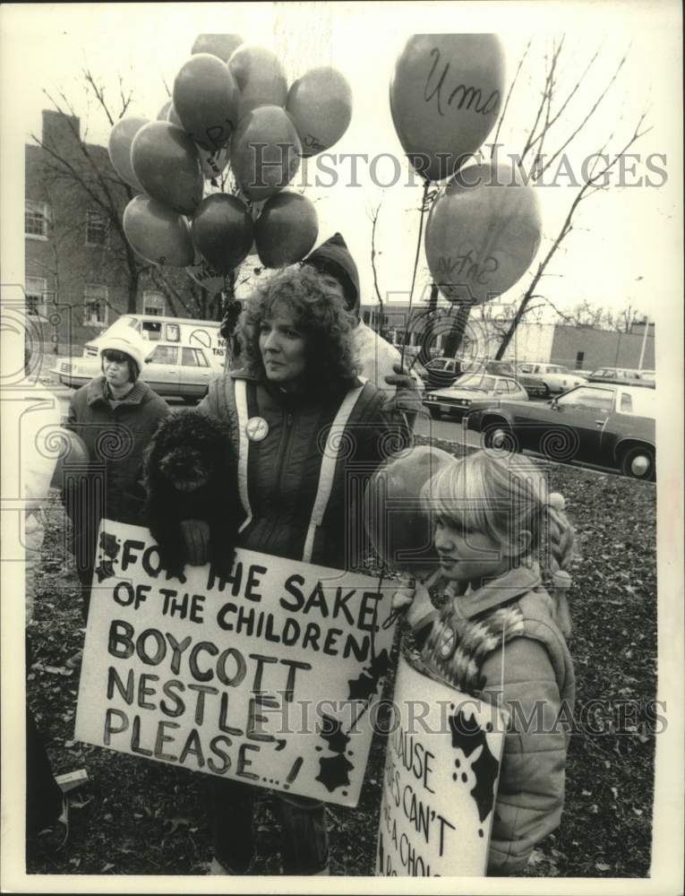 1983 Kathy Shae, Albany, NY with others protesting Nestle at store - Historic Images