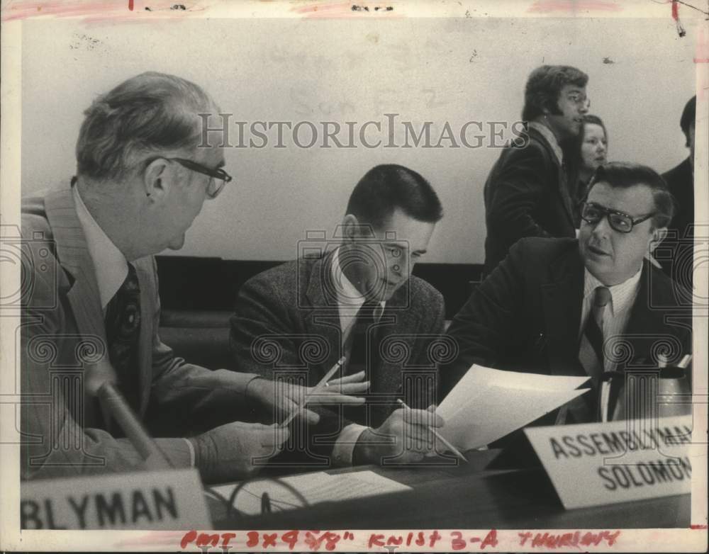 1974 New York Assemblymen discuss issue in Albany - Historic Images