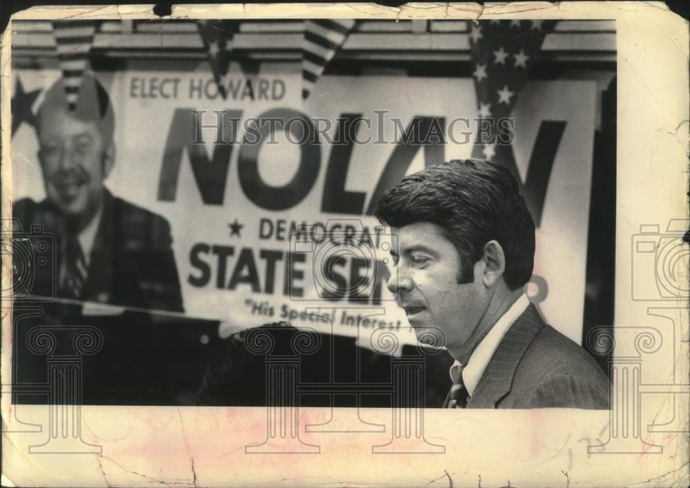 1979 Press Photo Howard Nolan in front of his election banner for state senator - Historic Images