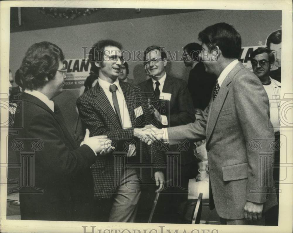 1977 Howard Nolan (right) with unidentified supporters at rally - Historic Images