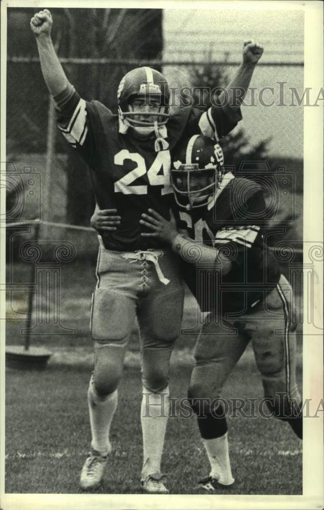 1978 Scotia, New York high school football players celebrate scoring - Historic Images