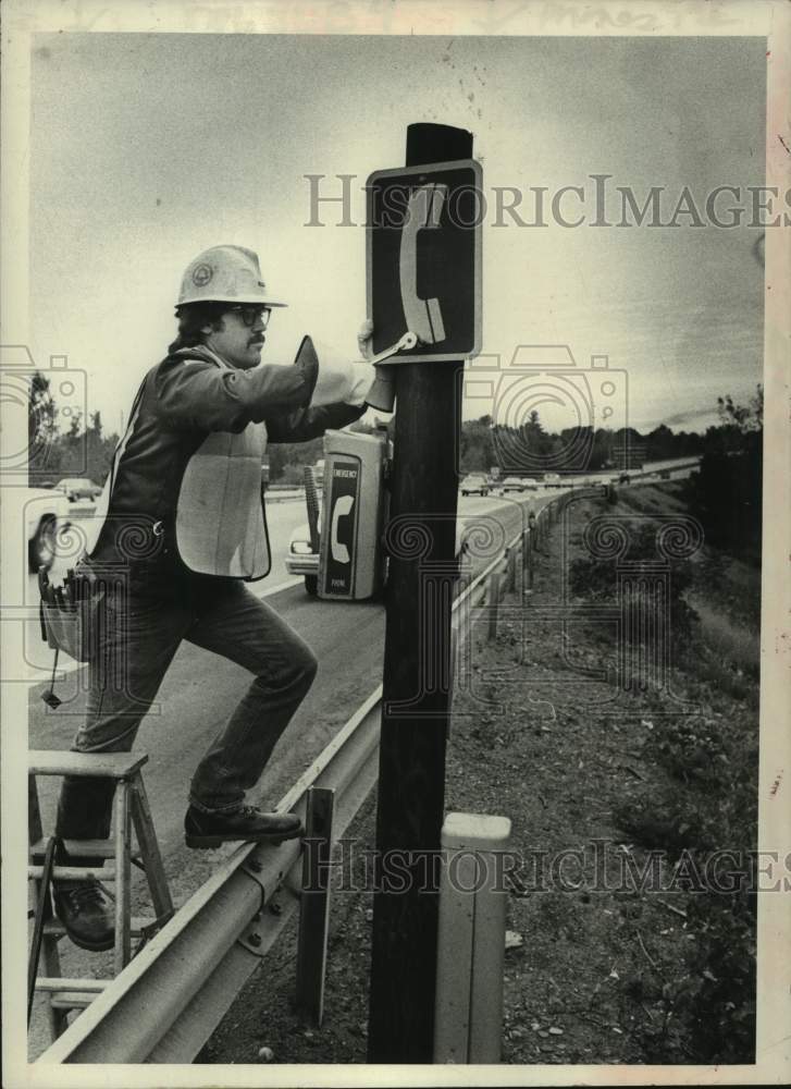 1981 Roadside emergency phone being removed in Albany, New York - Historic Images