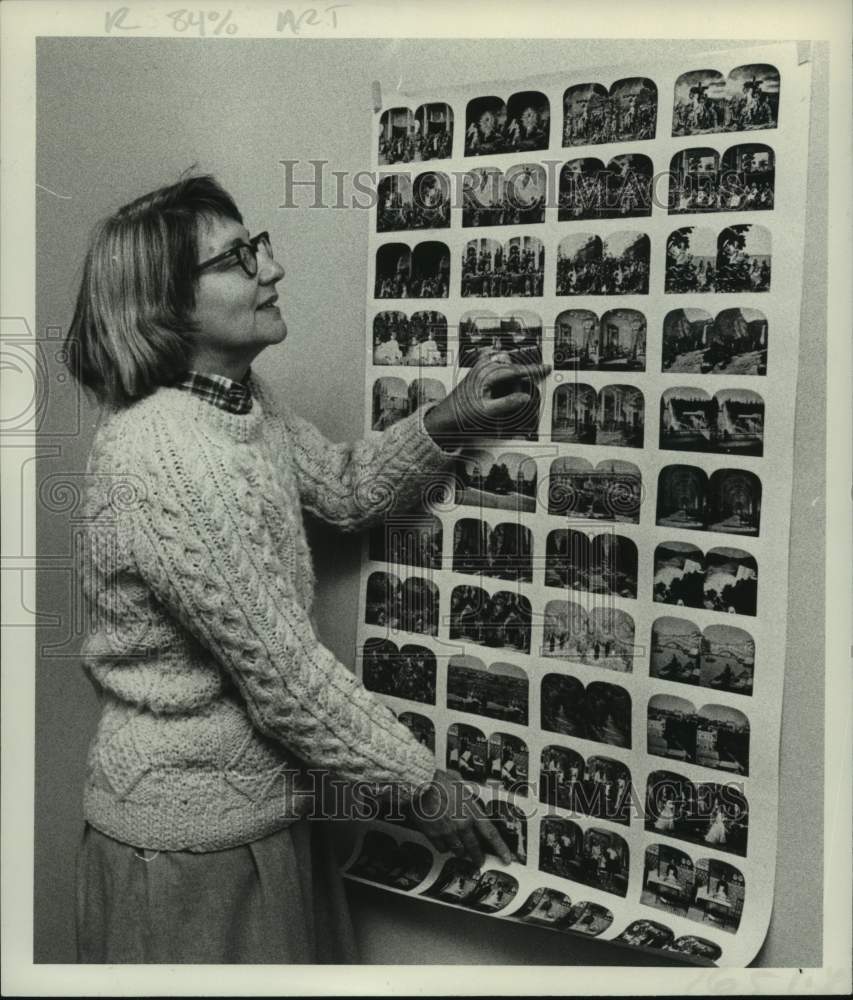 1982 Press Photo Arlen Westbrook admires wall poster in Albany, New York - Historic Images
