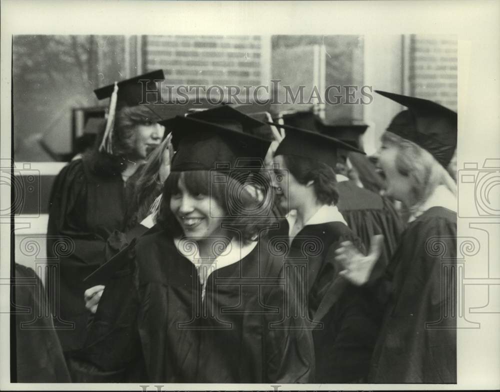 Press Photo Students in graduation caps and gowns. Risage - tua15105 - Historic Images