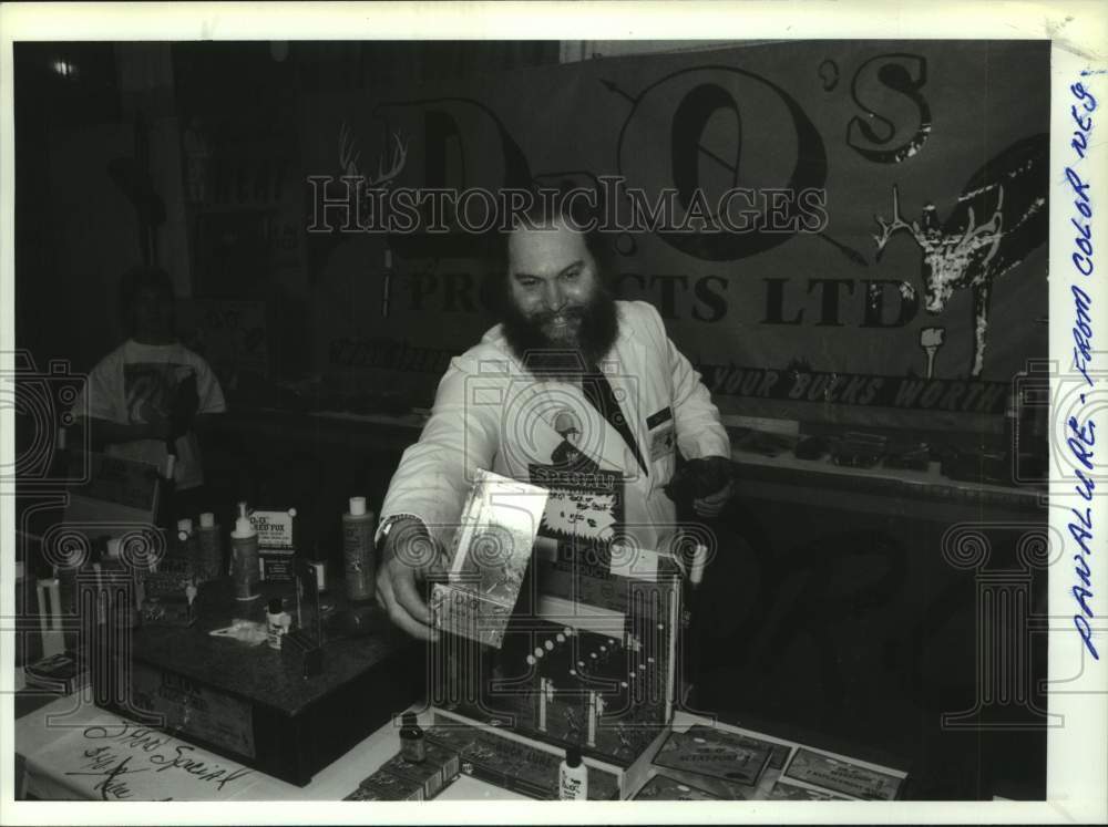 Press Photo Dr. O shows off deer scents at wildlife expo in Albany, New York - Historic Images