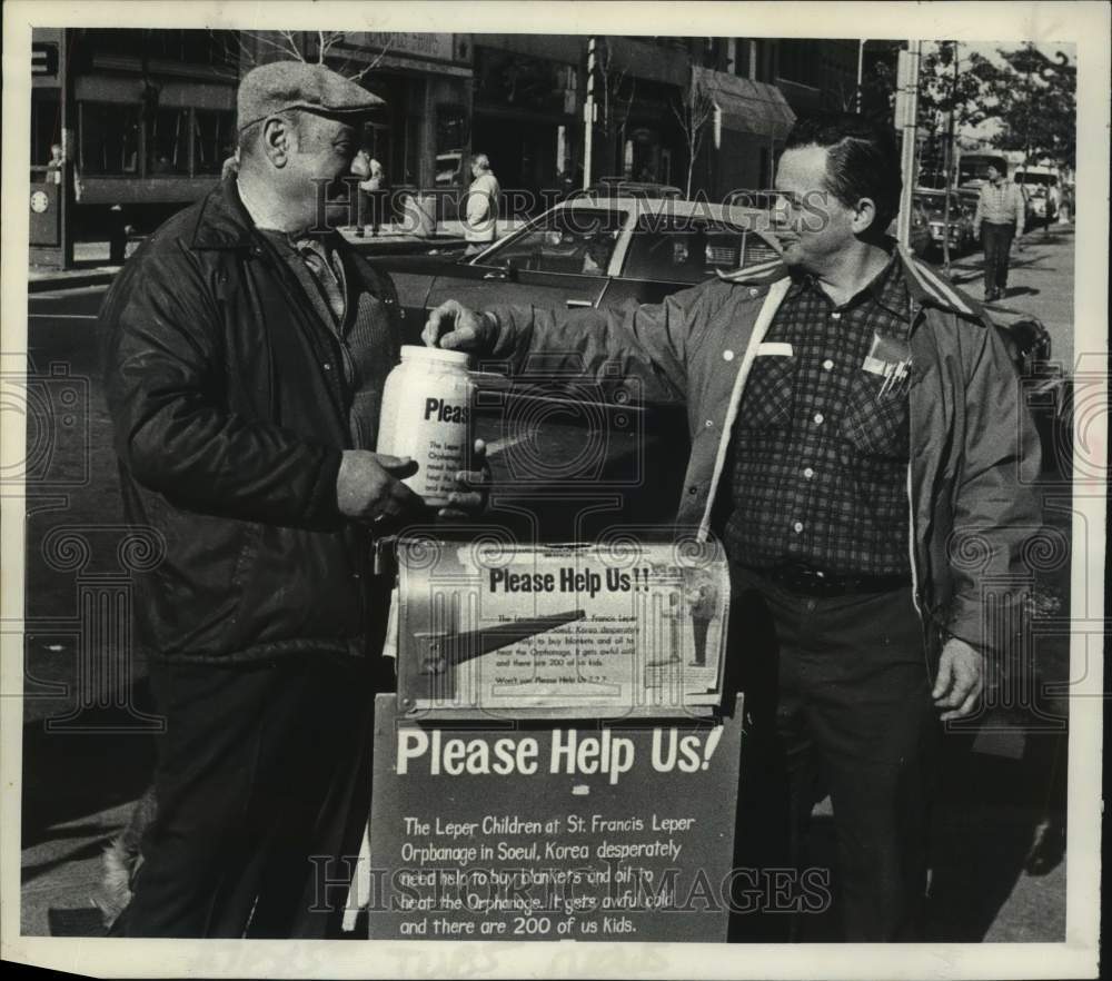 1982 Albert Nous raises funds for Korean orphans in Troy, New York - Historic Images