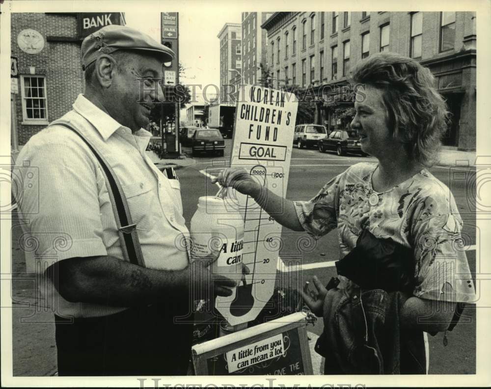 1986 Press Photo Albert Nous raises funds for Korean orphans in Troy, New York - Historic Images