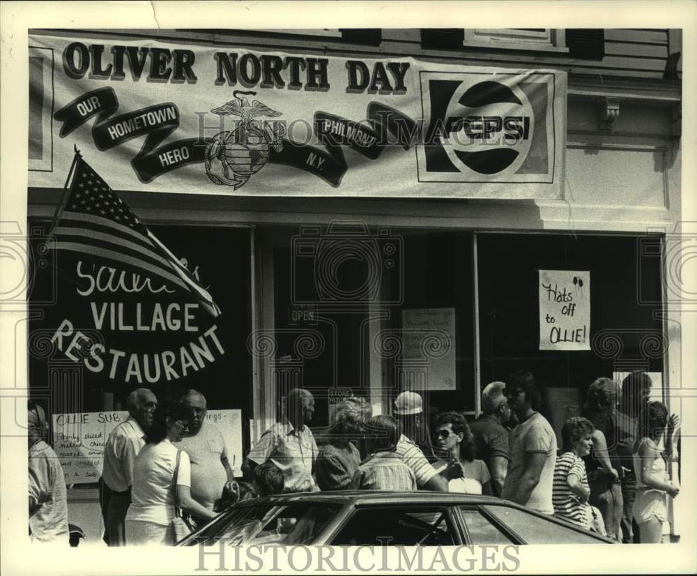 1987 Press Photo People congregate in Philmont, New York for Oliver North Day - Historic Images