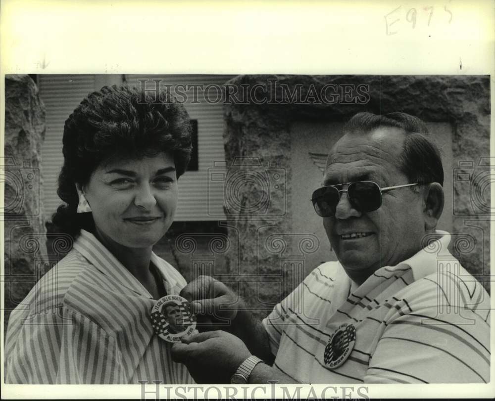 1987 Press Photo Philmont, New York officials wear buttons on Oliver North Day - Historic Images