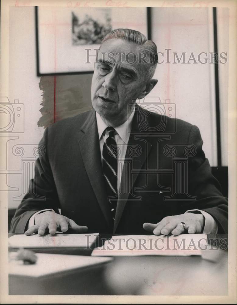 1963 Press Photo General Cortlandt Van Reus Schuyler sitting at desk with papers-Historic Images