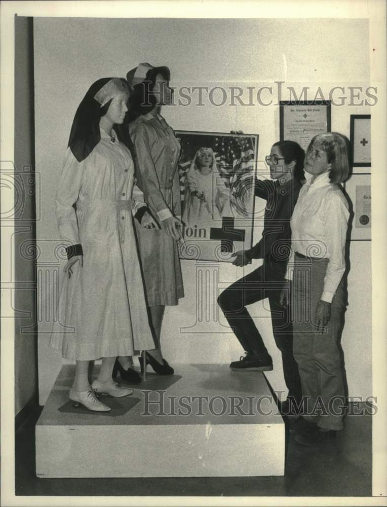 1984 Curators prepare Red Cross exhibit at Schenectady, NY Museum - Historic Images