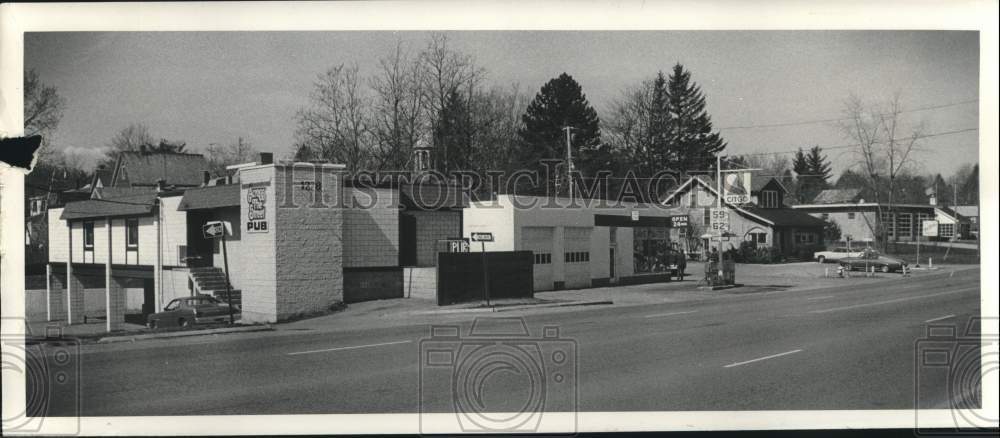 1979 Press Photo Western Avenue, looking west, with business and homes. - Historic Images