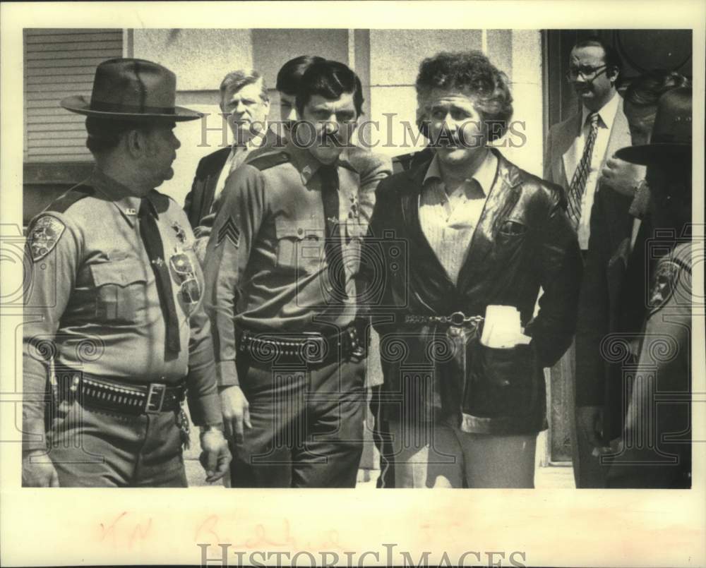 1981 Press Photo Police escort William Sasso in Albany, New York - tua16722 - Historic Images