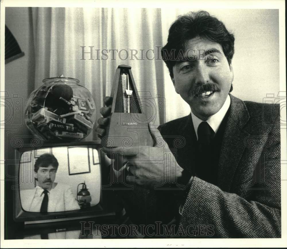 1987 Press Photo Bernard Schallehn shows metronome in Albany, New York - Historic Images