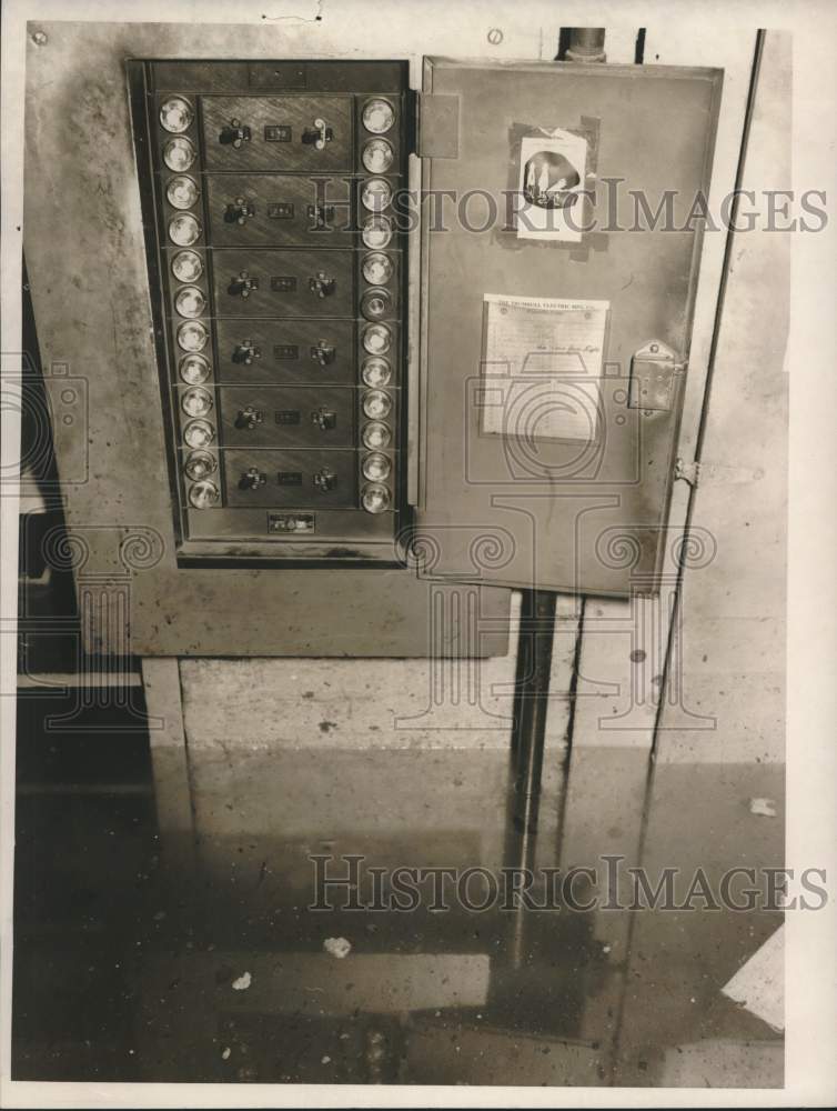1958 Water main break floods cellar of Albany Hardware, Albany, NY - Historic Images