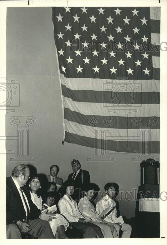 Press Photo People wait for swearing in at Naturalization Ceremony, Schenectady - Historic Images