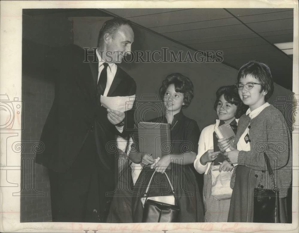 1963 Principal shows students where classroom is in Albany, New York - Historic Images