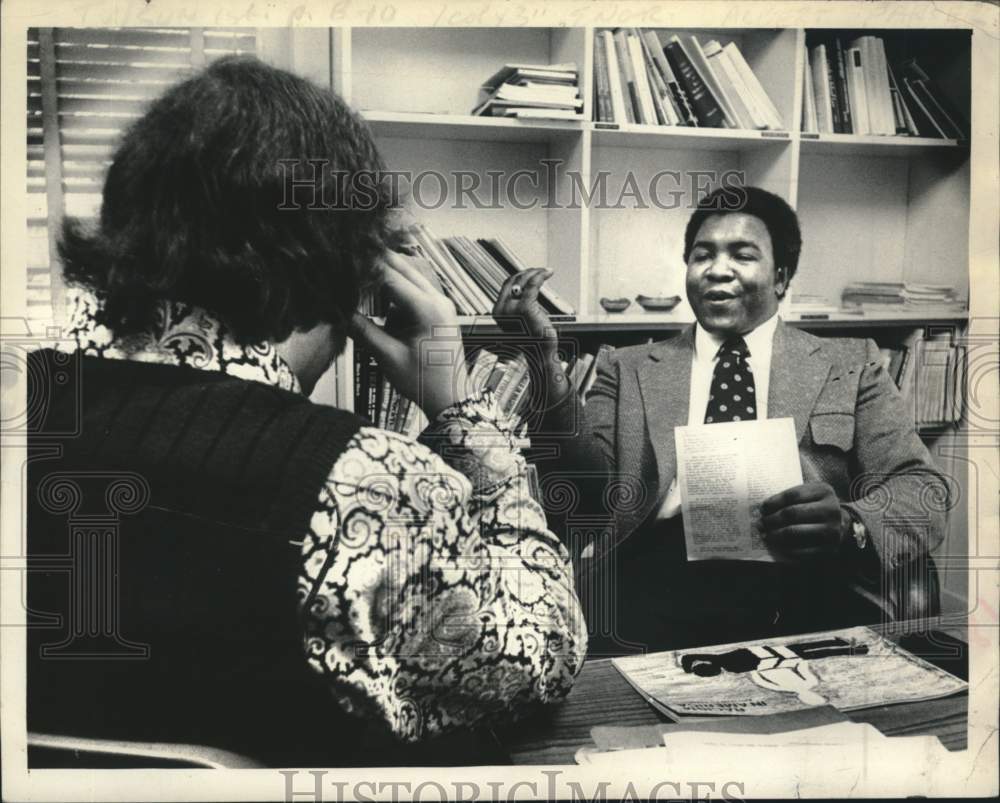 1972 Albert Parker speaks with unidentified person - Historic Images