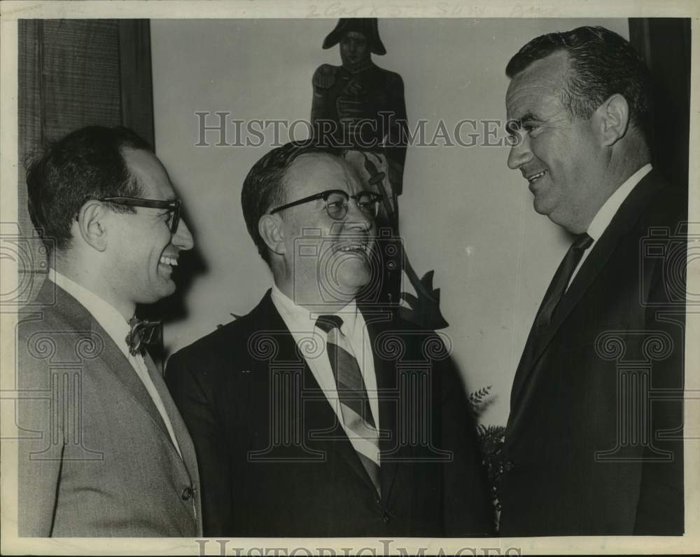 1968 John Shambo (R) talks with others at Industrial Research dinner - Historic Images