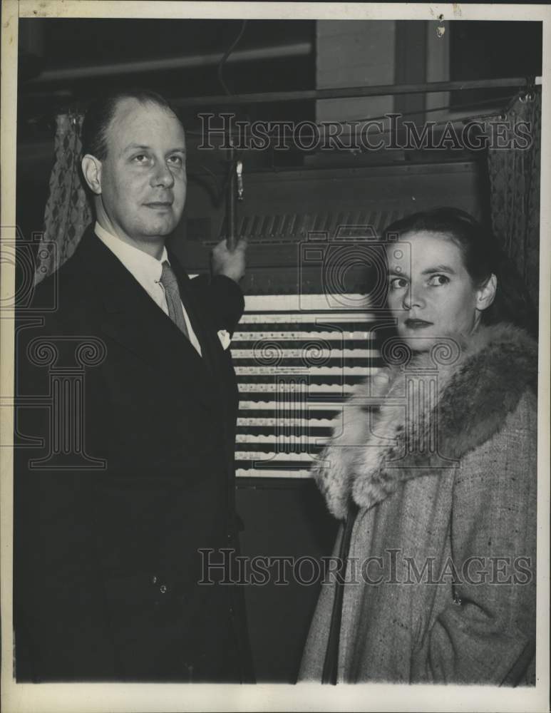 1945 Newbold Morris and his wife stand before voting machine in NY - Historic Images