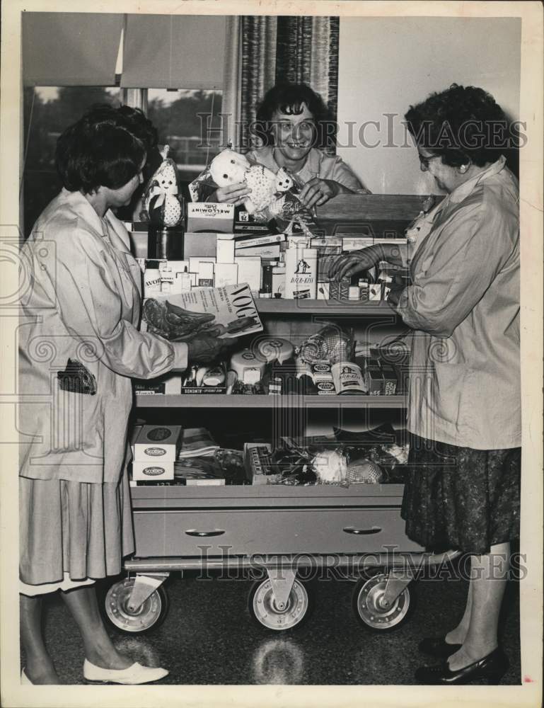 1963 Ladies check gift cart items, St. Peter's Hospital, Albany, NY - Historic Images