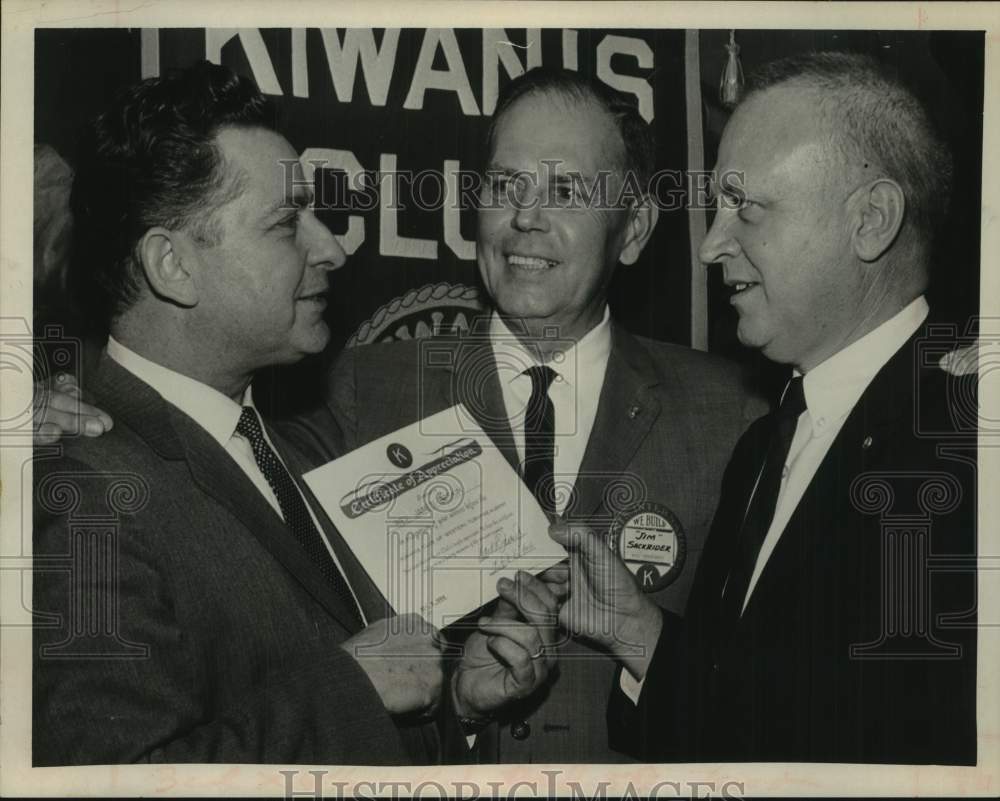 1966 James Sackrider speaks to Kiwanis group in Albany, New York - Historic Images