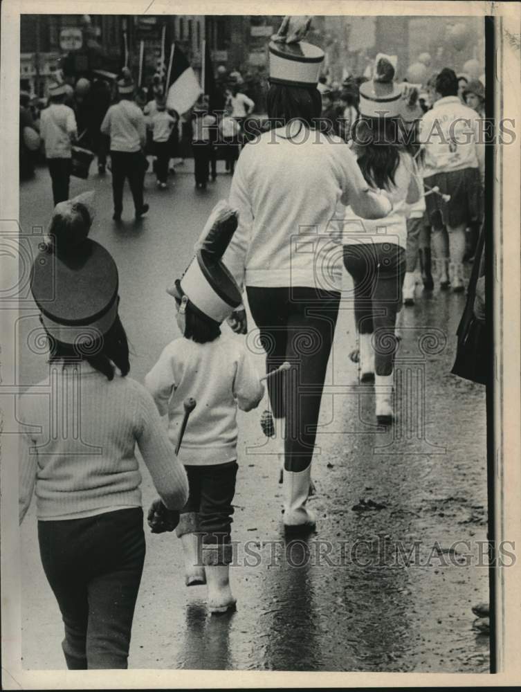1970 Marchers young and old walk in St Patrick's Day Parade - Historic Images