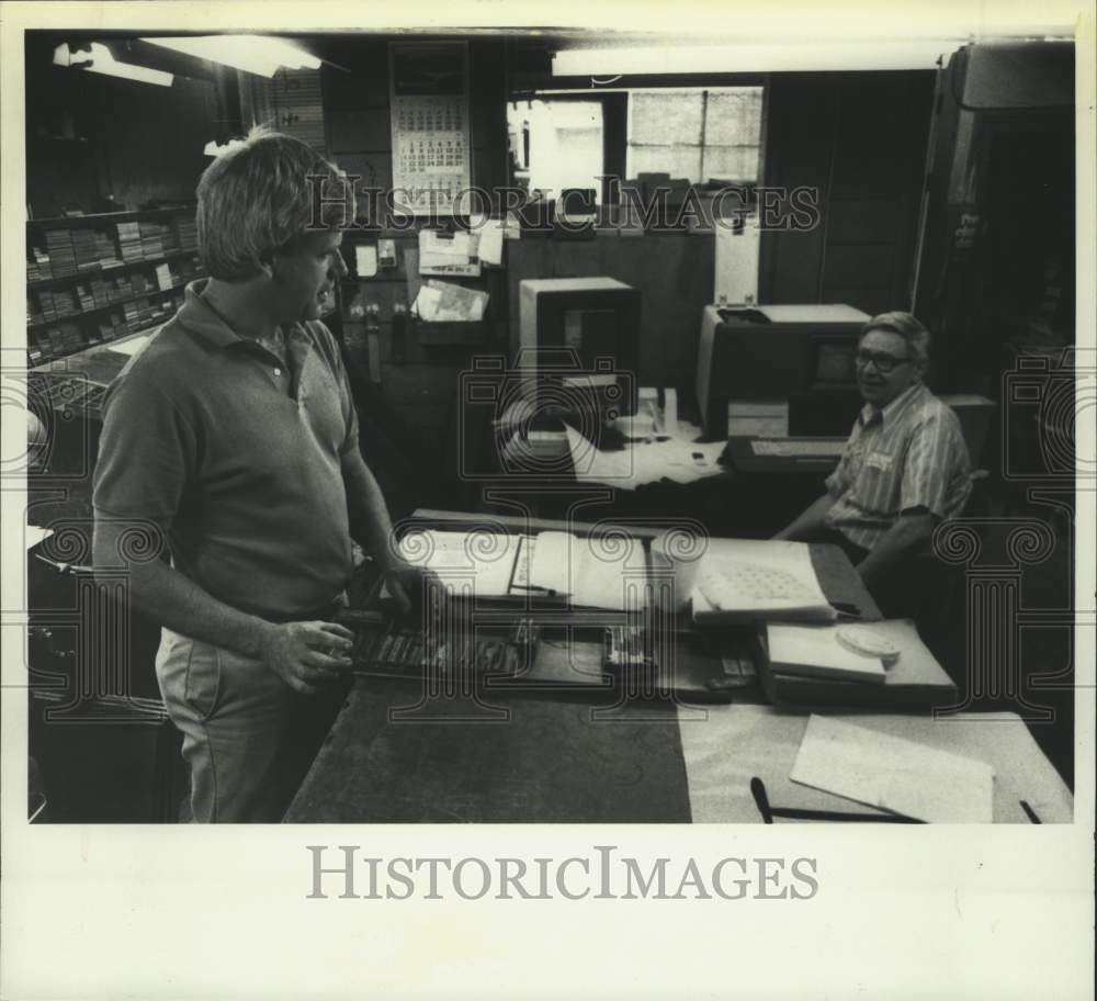 1987 Father & son at work at their Albany, New York print shop - Historic Images