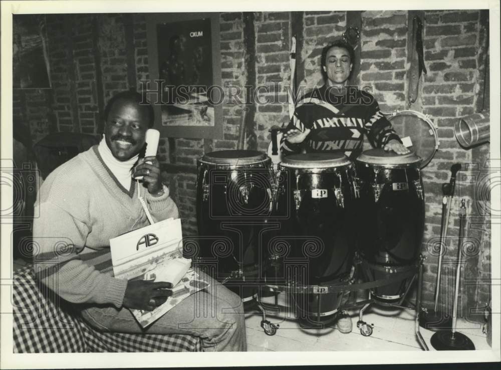 1992 Press Photo Ulysses Love on phone in Saratoga, New York music studio- Historic Images