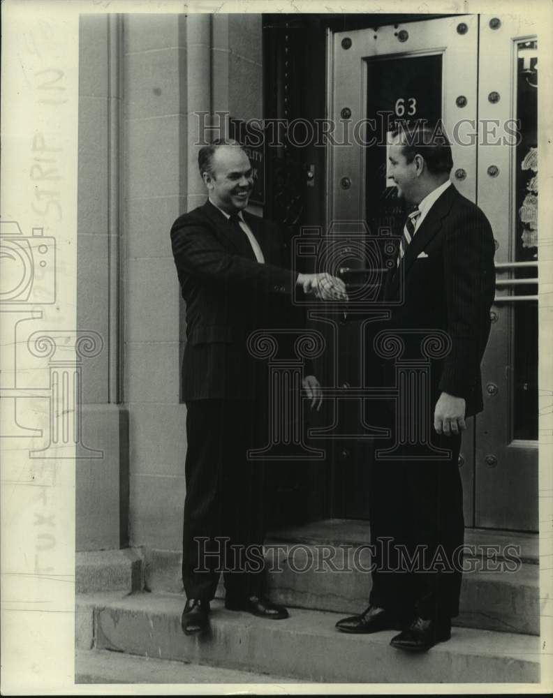 1973 Patrick J Ryan and John f McGillicuddy shake hands outside - Historic Images
