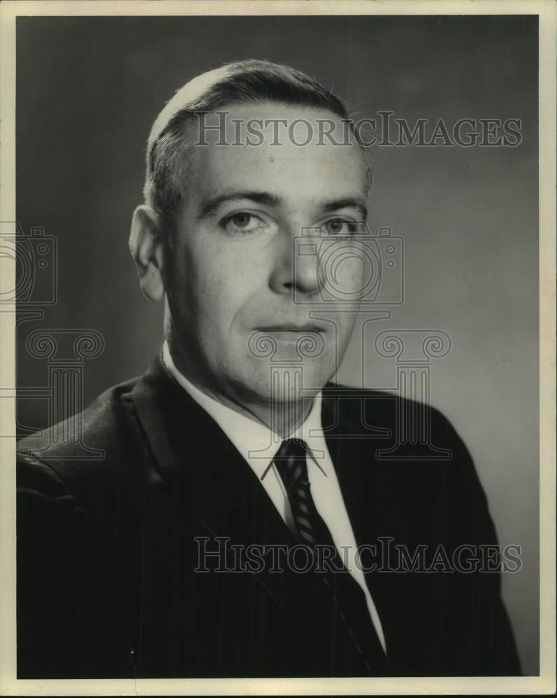 1967 Reid L Shaw sits for portrait - Historic Images
