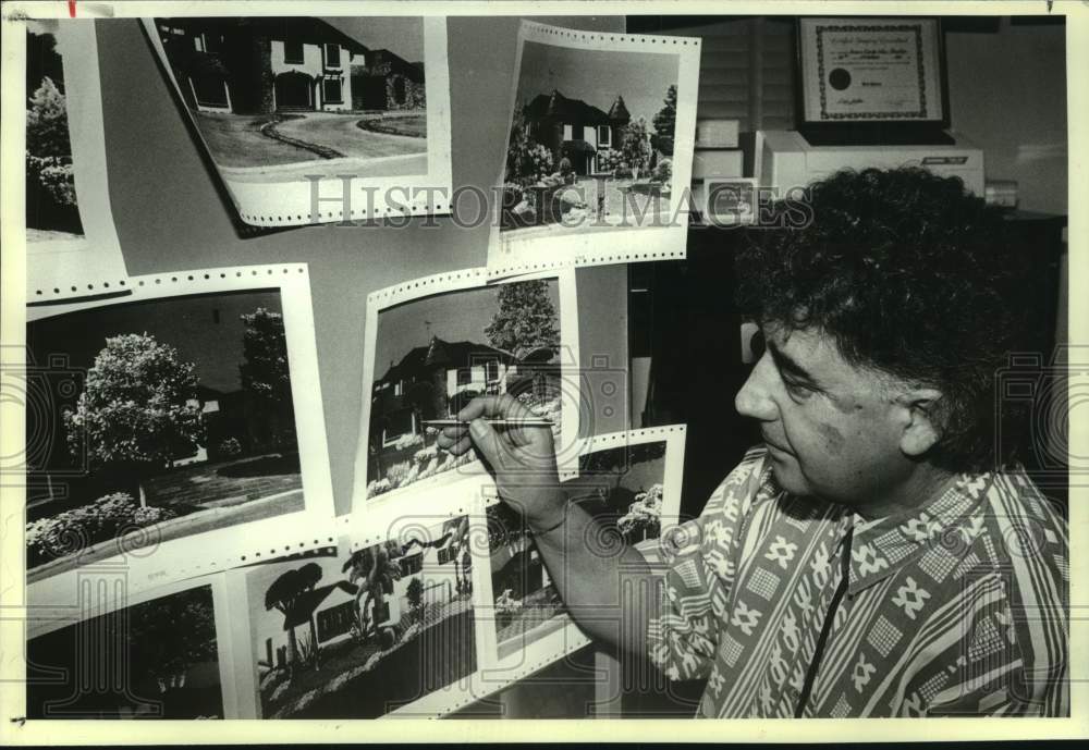 1990 Peter Shaw with photos of landscapes that he designed in NY - Historic Images