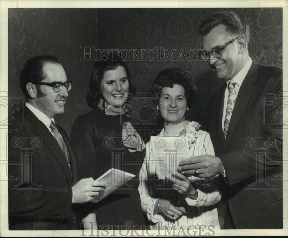 1972 Fund raising group studies papers in New York - Historic Images