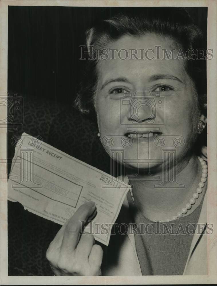 1967 Press Photo Mrs. Francis Luck shows winning lottery receipt in New York - Historic Images