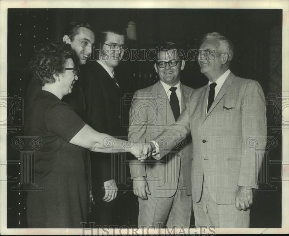 1972 Stewart Ludwig and others at a business event - Historic Images